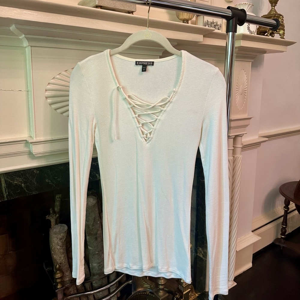 Women’s Express top with lace-up detail. Size XS. White.